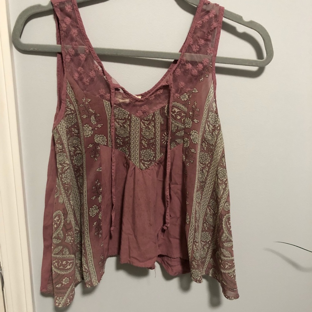 Cute tank top pairs perfectly with jeans!